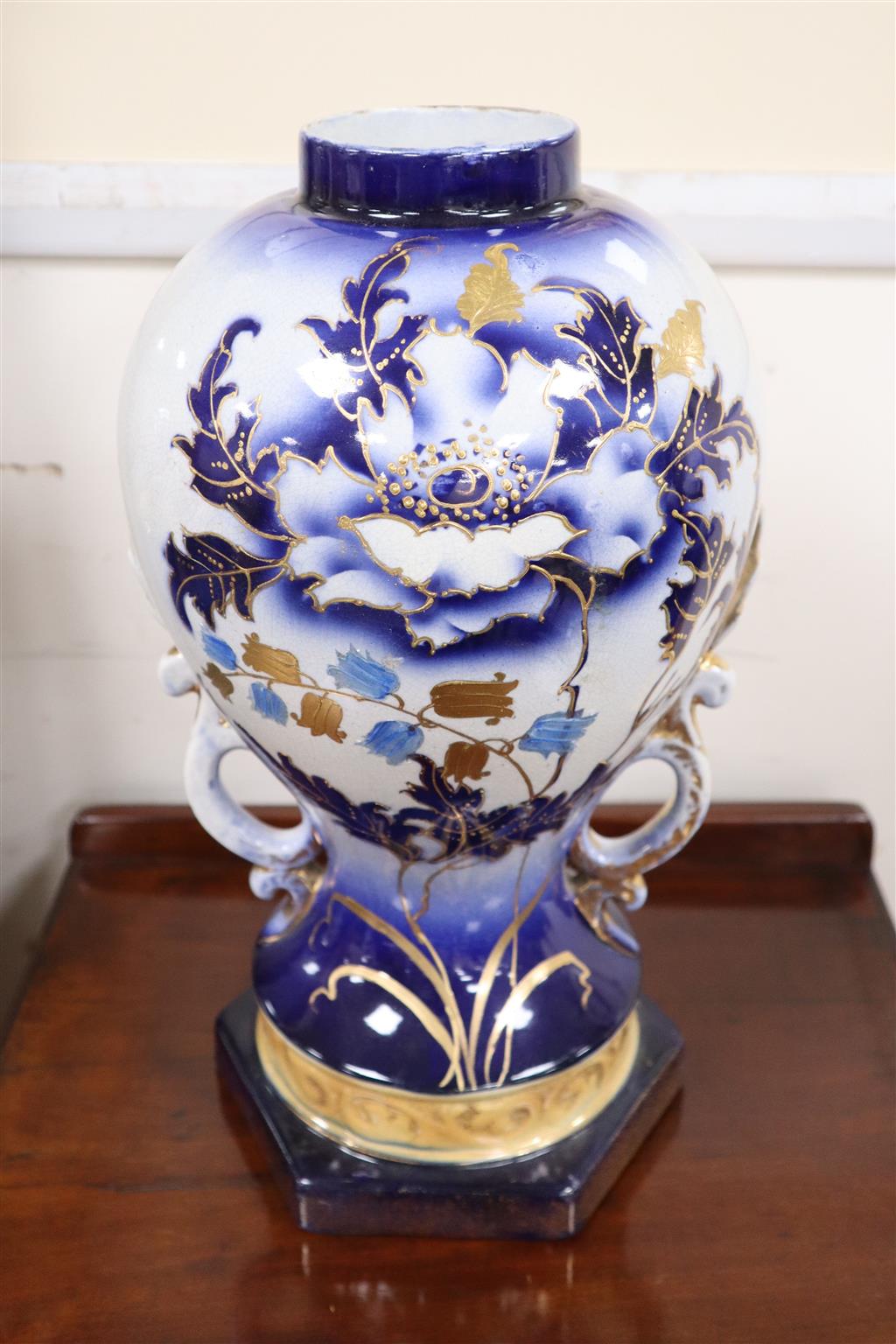 A pair of Edwardian blue and white china vases